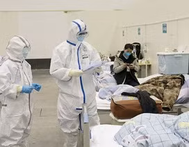 Thành phố Trung Quốc dùng biện pháp “thời chiến” ngăn chặn virus corona