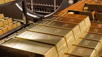 Vàng rung lắc trên đà giảm giá
