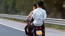 Làm rõ clip thanh niên đầu trần đi xe máy kẹp 3 lao vun vút trên cao tốc