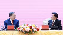Tổng Bí thư, Chủ tịch nước Lào thông tin về kết quả Đại hội XII Đảng NDCM Lào