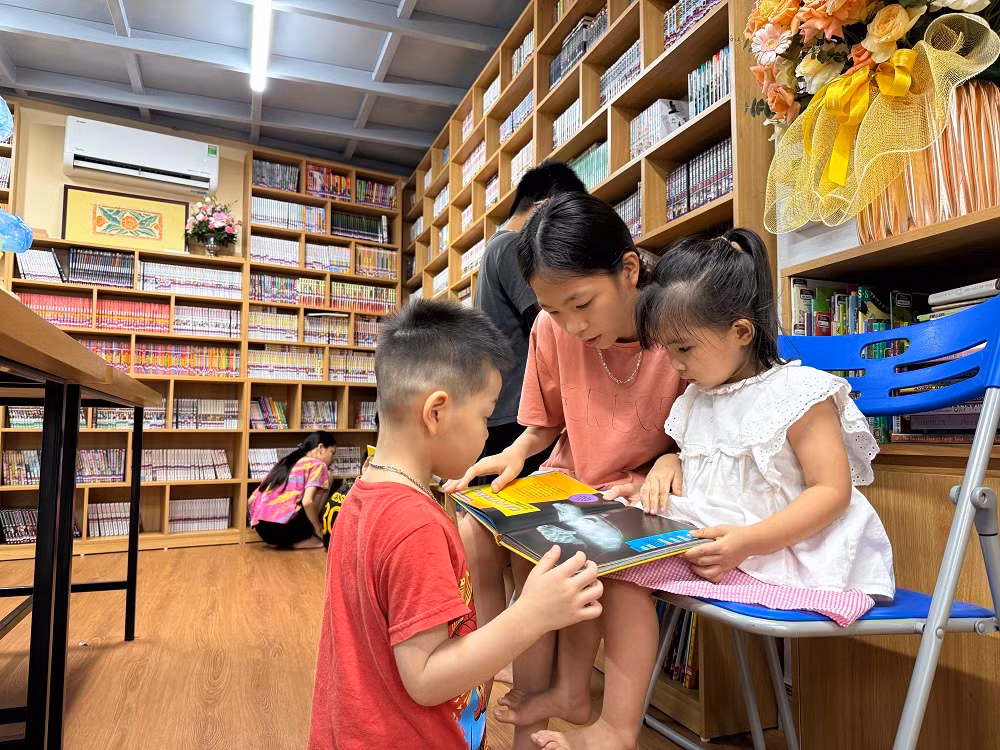 Độc đáo một xã có 2 thư viện -0