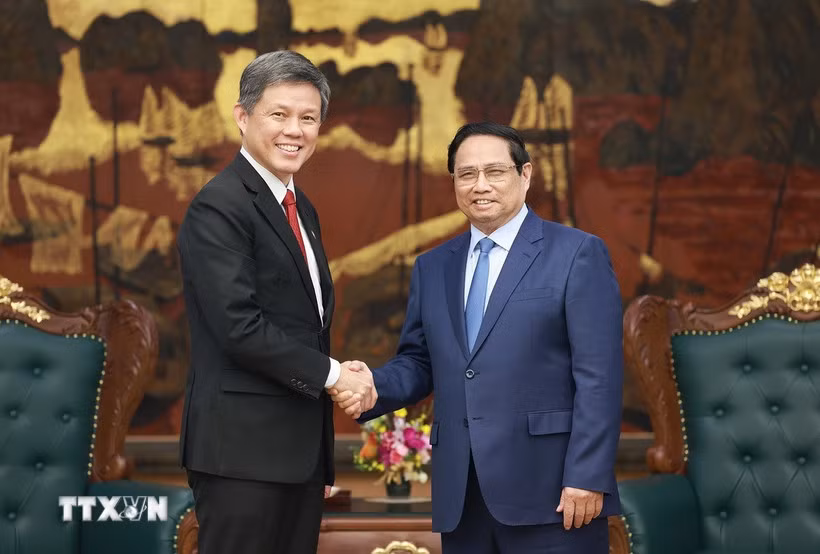 Thủ tướng tiếp Bộ trưởng Điều phối Dịch vụ công, Bộ trưởng Quốc phòng Singapore -0