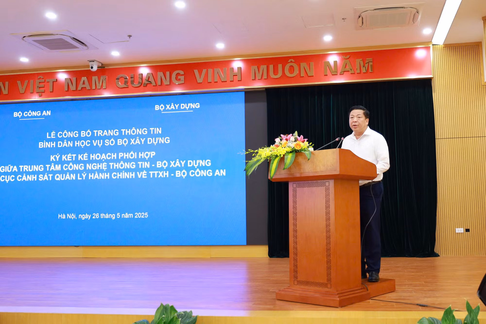 Bộ Công an và Bộ Xây dựng phối hợp đẩy mạnh chuyển đổi số -0