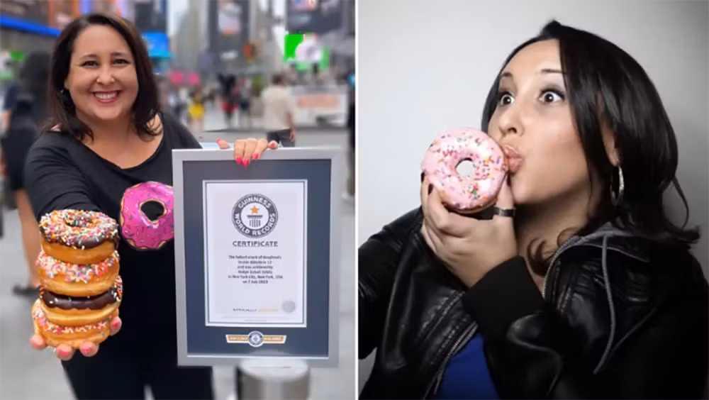 robyn schall cùng sách kỷ lục guinness của mình. ảnh the guinness record..png -0