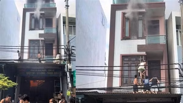 Người dân trèo tường cứu 4 người trong đám cháy