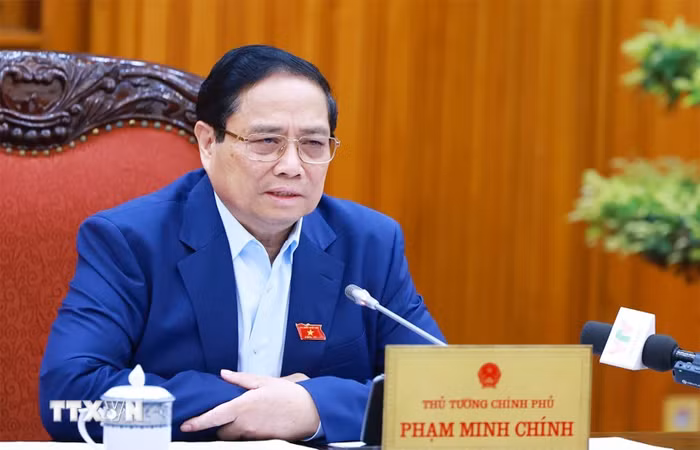 Thủ tướng Phạm Minh Chính chủ trì họp Thường trực Chính phủ về kiểm soát lạm phát. (Ảnh: Dương Giang/TTXVN)