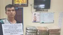 Đối tượng người Việt Nam và Lào câu kết "mang" 32 bánh heroin vào Việt Nam