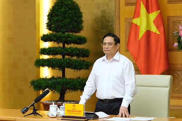 Thủ tướng Phạm Minh Chính phát biểu tại cuộc làm việc với các nhà khoa học, các đơn vị, doanh nghiệp tham gia nghiên cứu, sản xuất vaccine phòng chống COVID-19 tại Việt Nam.