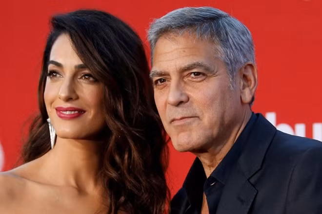 Hai vợ chồng nam tài tử Clooney. Ảnh Getty