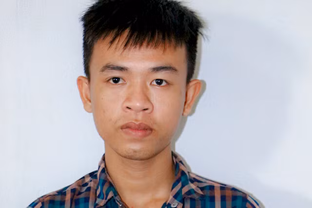 Hòa tại cơ quan điều tra.