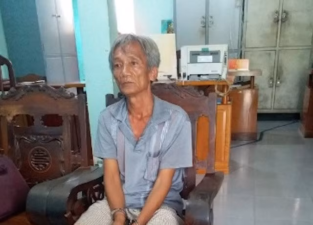 Dũng khi bị bắt giữ.