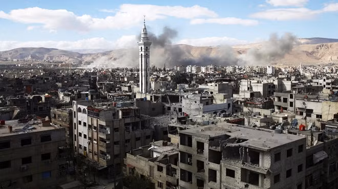 Khu vực Đông Ghouta tan hoang sau các trận giao tranh ác liệt. Ảnh: Reuters
