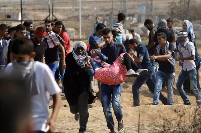 Xung đột leo thang tại dải Gaza giữa người Palestine và lực lượng an ninh Israel. Ảnh: Reuters