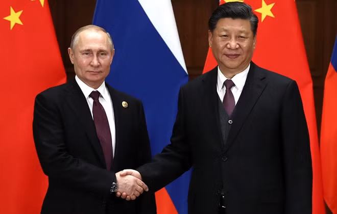 Tổng thống Putin và Chủ tịch Trung Quốc Tập Cận Bình tại Moscow. Ảnh: TASS