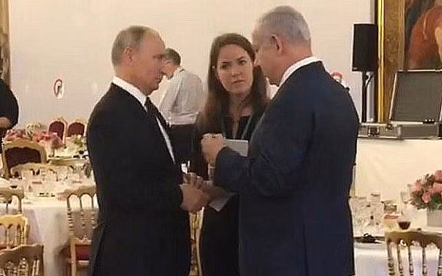Tổng thống Putin và Thủ tướng Netanyahu trò chuyện ở Paris. Ảnh: ITN