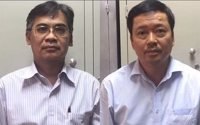 Bị can Nghĩa (trái) và Huy khi bị bắt.