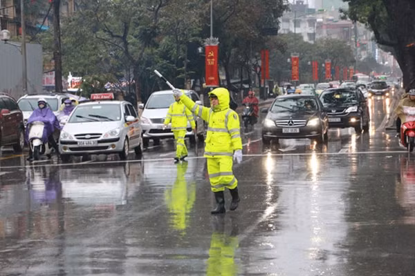 Hướng dẫn các phương tiện đi đúng hướng.