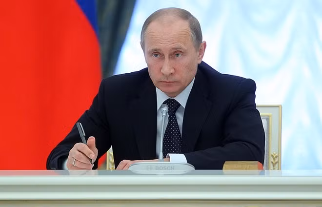 Tổng thống Nga Vladimir Putin ngày 16-10 đã ký một sắc lệnh về các biện pháp thực hiện Nghị quyết trừng phạt của Hội đồng Bảo an Liên Hợp Quốc đối với CHDCND Triều Tiên. Ảnh: TASS