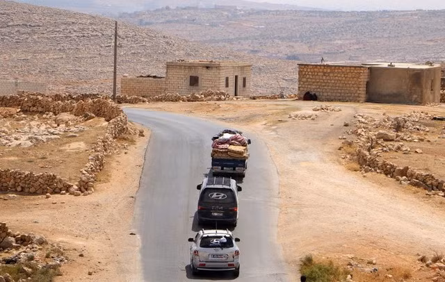 Chỉ trong 10 ngày đầu tháng 9, hơn 30.000 người Syria ở Idlibi đã phải di tản khẩn cấp. Ảnh: AP