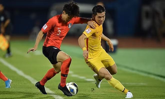 U23 Hàn Quốc (áo đỏ) có được 3 điểm đầu tiên ở vòng chung kết châu Á 2020 một cách đầy vất vả. Ảnh: AFC.