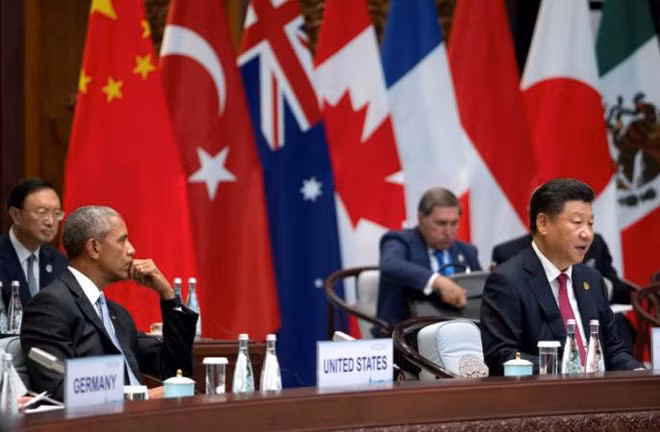 Tổng thống Mỹ Barack Obama (trái) và Chủ tịch Trung Quốc Tập Cận Bình tại Lễ khai mạc Hội nghị thượng đỉnh G20. Ảnh: Reuters. Tổng thống Mỹ Barack Obama (trái) và Chủ tịch Trung Quốc Tập Cận Bình tại Lễ khai mạc Hội nghị thượng đỉnh G20. Ảnh: Reuters.