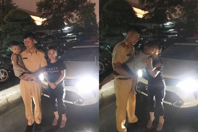 Chị Huyền nhận lại cháu Nhân từ lực lượng CSGT.