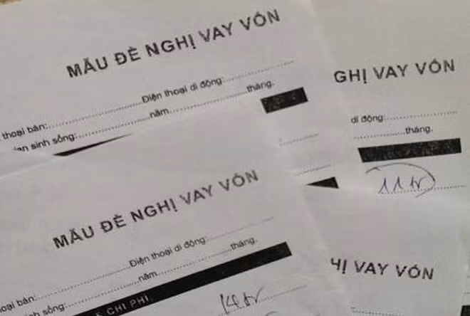 Cẩn trọng với những lời mời chào làm hồ sơ vay tín chấp ngân hàng. (Ảnh minh họa)