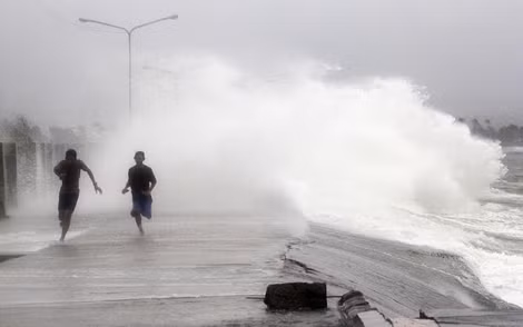 Theo thông tin mới nhất từ CNN đã có ít nhất 21 người thiệt mạng vì bão Hagupit tại Philippines. Ảnh: EPA.