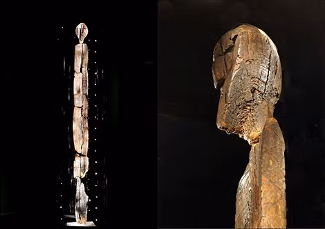 Big Shigir Idol cao bằng tòa nhà 2 tầng (trái) và phần đầu của bức tượng Shigir nhìn từ mặt bên.