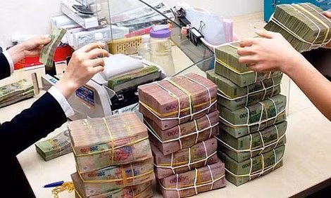 Một trong những thành công nổi bật của ngành ngân hàng năm 2015 là đã đưa tỷ lệ nợ xấu về mức dưới 3% trước thời gian dự kiến. Ảnh minh họa.