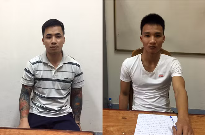 Ðối tượng Vũ Ðại Nghiệp (trái) và Hoàng Ngọc Ðiệp tại CQÐT.