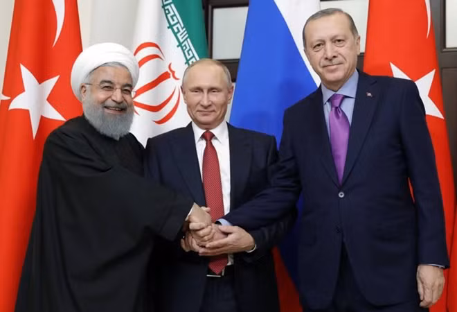 Tổng thống Iran (trái), Nga (giữa) và Thổ Nhĩ Kỳ tại Hội nghị Thượng đỉnh hôm 14-2.
