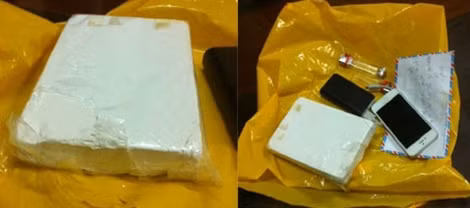 Bánh heroin và tang vật thu giữ.
