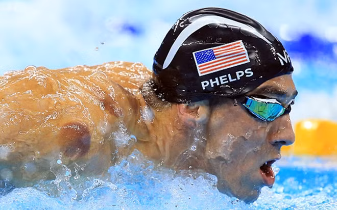 Sự toả sáng của Michael Phelps đã giúp đoàn thể thao Mỹ tiếp tục dẫn đầu Olympic