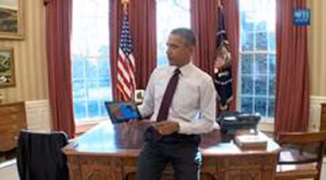 Obama và chiếc iPad.