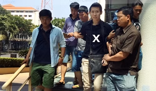 Hung thủ Minh (dấu x) được đưa về trụ sở