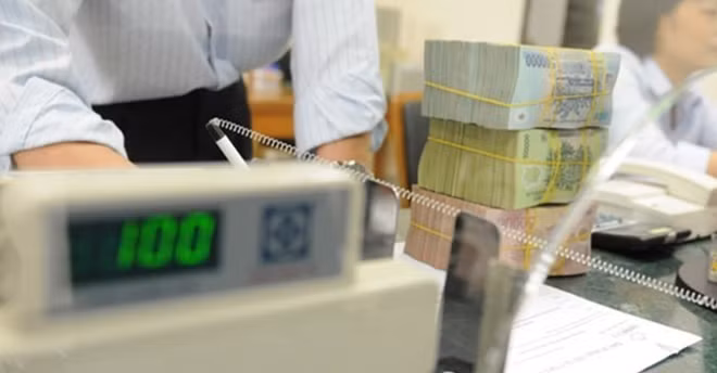 NHNN sẽ xử lý nghiêm những ngân hàng lách trần lãi suất USD. Ảnh minh họa