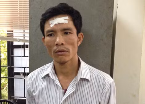 Nguyễn Xuân Tuệ khi bị bắt giữ.