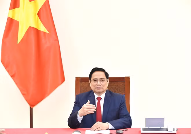 Thủ tướng Phạm Minh Chính điện đàm với Tổng Giám đốc WHO. Ảnh: VGP/Nhật Bắc.