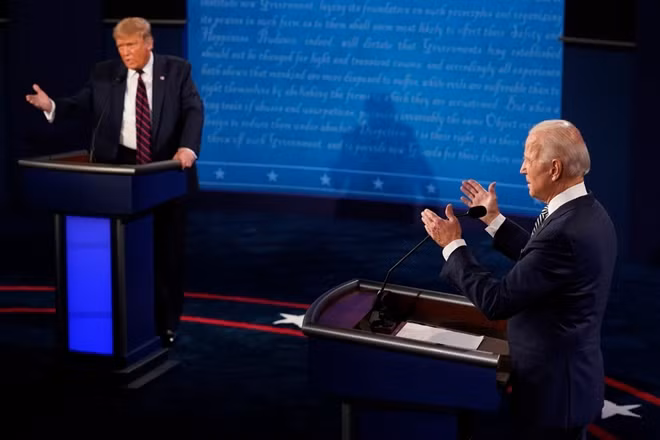Tổng thống Mỹ Donald Trump và ứng viên đảng Dân chủ Joe Biden liên tục công kích nhau trong cuộc tranh luận đầu tiên hôm 29-9. ảnh: AP