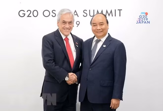 Thủ tướng Nguyễn Xuân Phúc gặp Tổng thống Cộng hòa Chile Sebastián Piñera. (Ảnh: Thống Nhất/TTXVN)