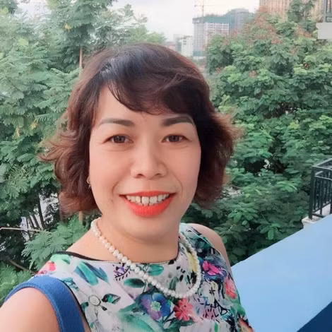 Chị Minh luôn giữ nụ cười tự tin.
