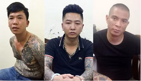 Đối tượng Trần Thanh Hải (trái) và đàn em tại cơ quan Công an.
