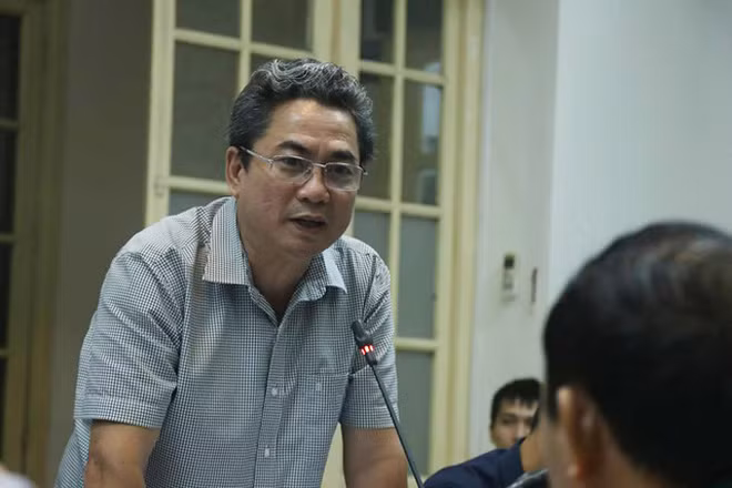Ông Nguyễn Đức Quang phát biểu tại cuộc họp.