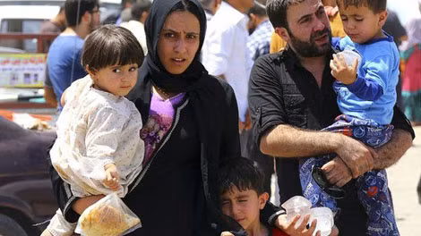 Người dân cố chạy khỏi Mosul sau khi thành phố rơi vào tay IS.