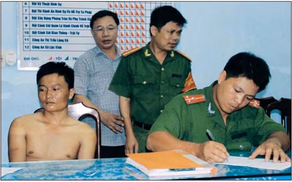 Nguyễn Văn Nghĩa tại cơ quan Công an.
