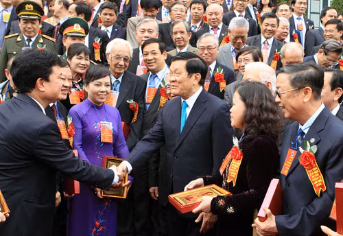 Chủ tịch nước Trương Tấn Sang với các đại biểu tại buổi gặp mặt. Ảnh: TTXVN