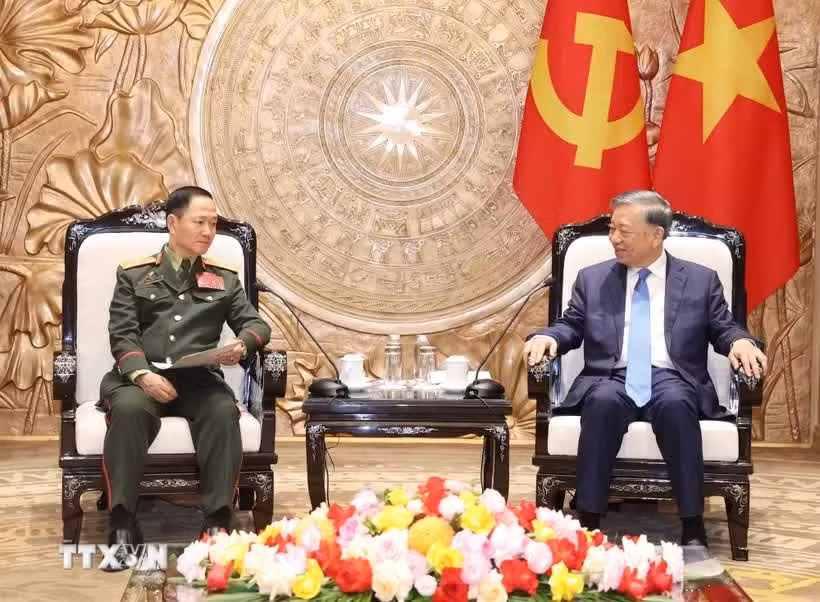 tong-bi-thu-chu-tich-nuoc-tiep-bo-truong-quoc-phong-lao.jpg