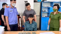 Vận chuyển 4 bánh heroin với giá cước 20 triệu đồng