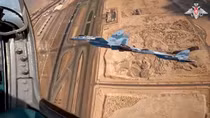 Su-35S mang tên lửa hộ tống ông Putin thăm Trung Đông